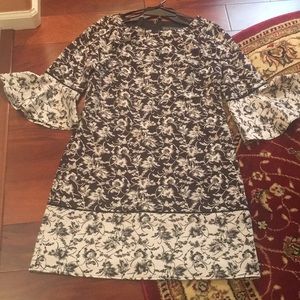 NWOT gorgeous bell sleeves dress for any event!